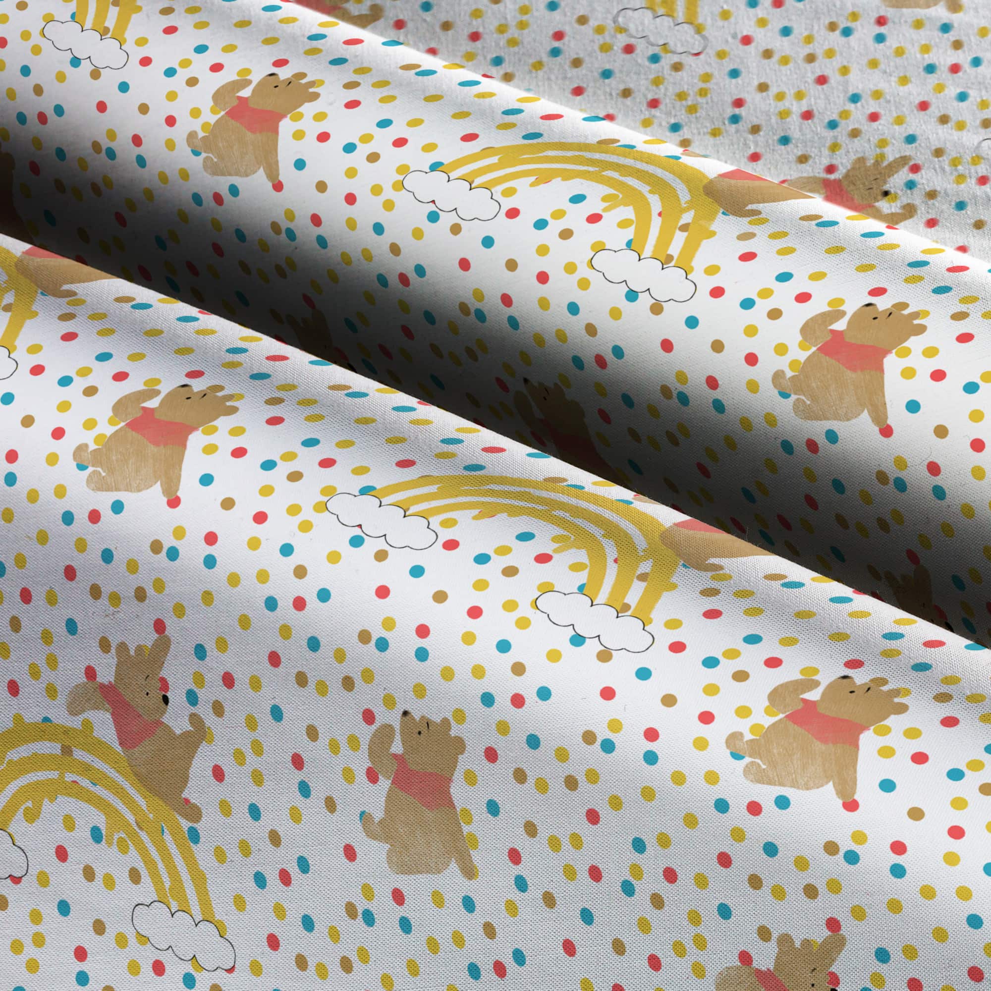 Disney® Winnie the Pooh Rainbow Jump Cotton Fabric